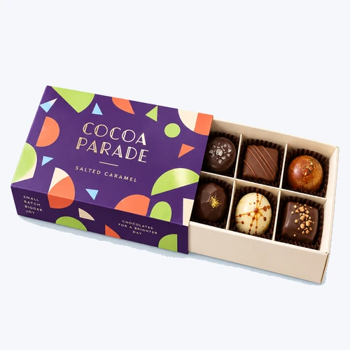 Custom chocolate boxes on a clean light blue background